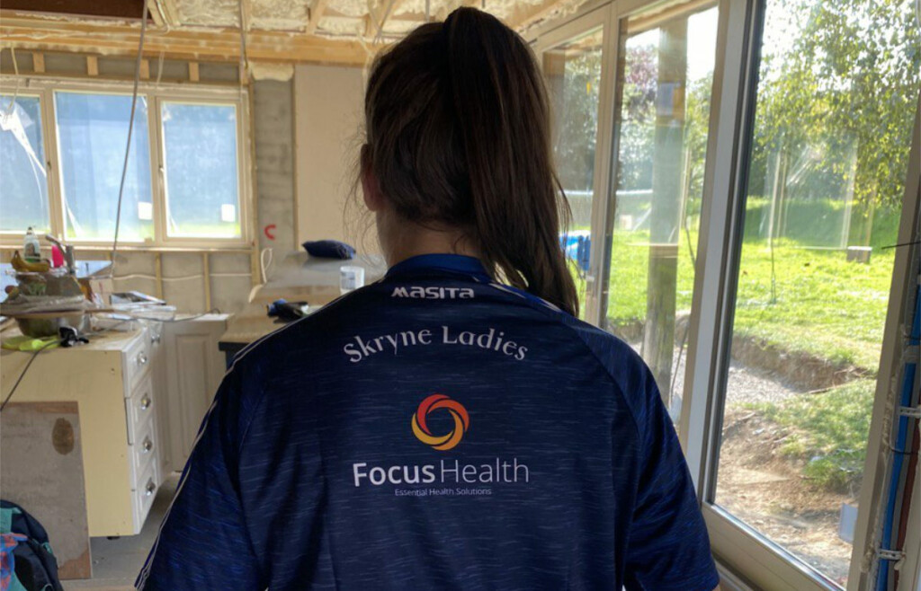 focus health logo on a sports teams shirt